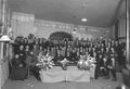 Huldiging Andreas Froklage (midden, zittend op de eerste rij met rechts naast hem Theo van Delft) t.g.v. zijn 40-jarig jubileum als leraar aan de Teekenschool. (GAW, fotonr.40460).